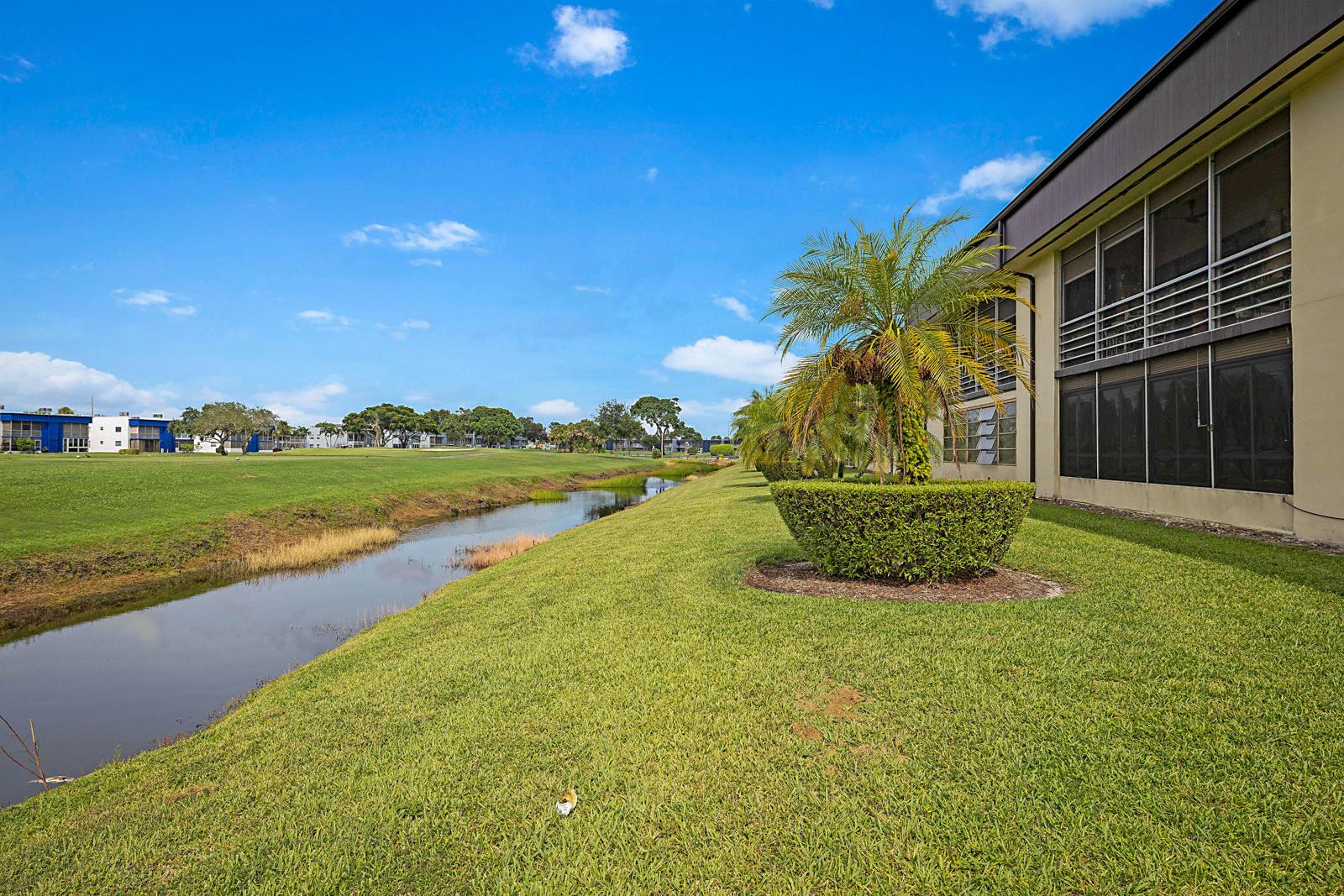 76 Capri B, Delray Beach, FL 33484 - golf course and water behind the building