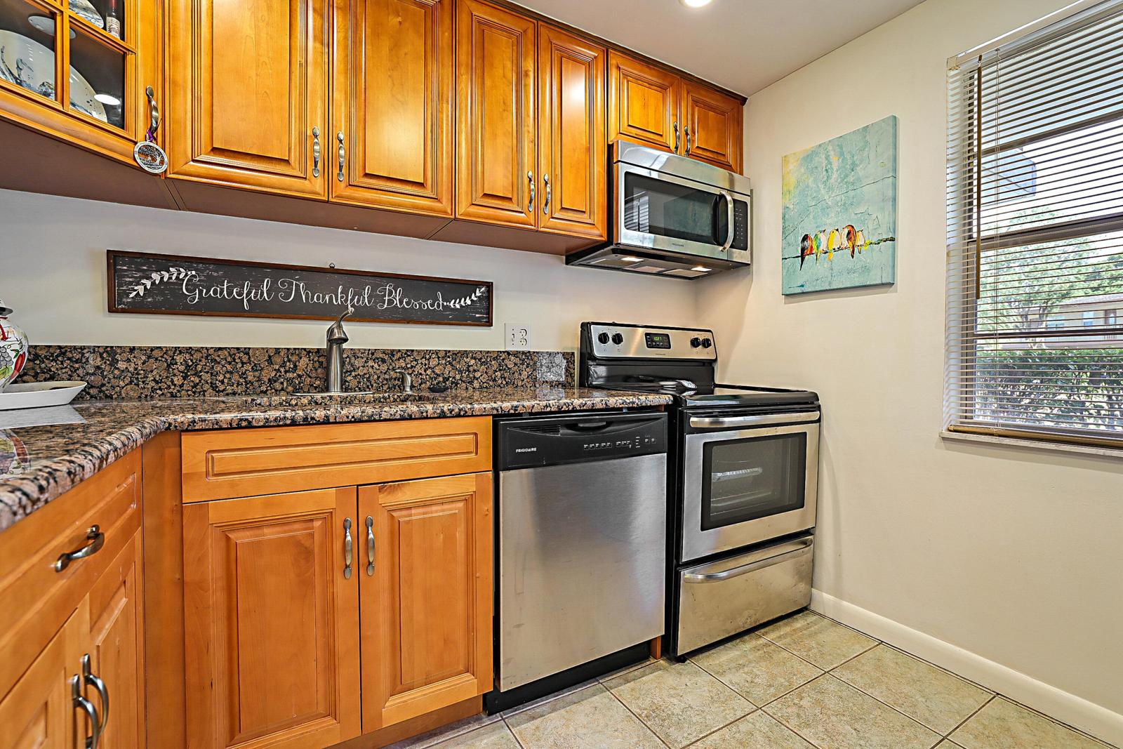 441 NW 76th Avenue #101, Margate, FL 33063 - kitchen with stainless steel appliances